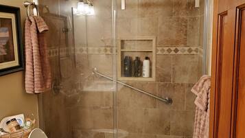 Shower, hair dryer, towels, soap