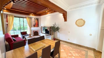 60-inch flat-screen TV with satellite channels, TV, Netflix