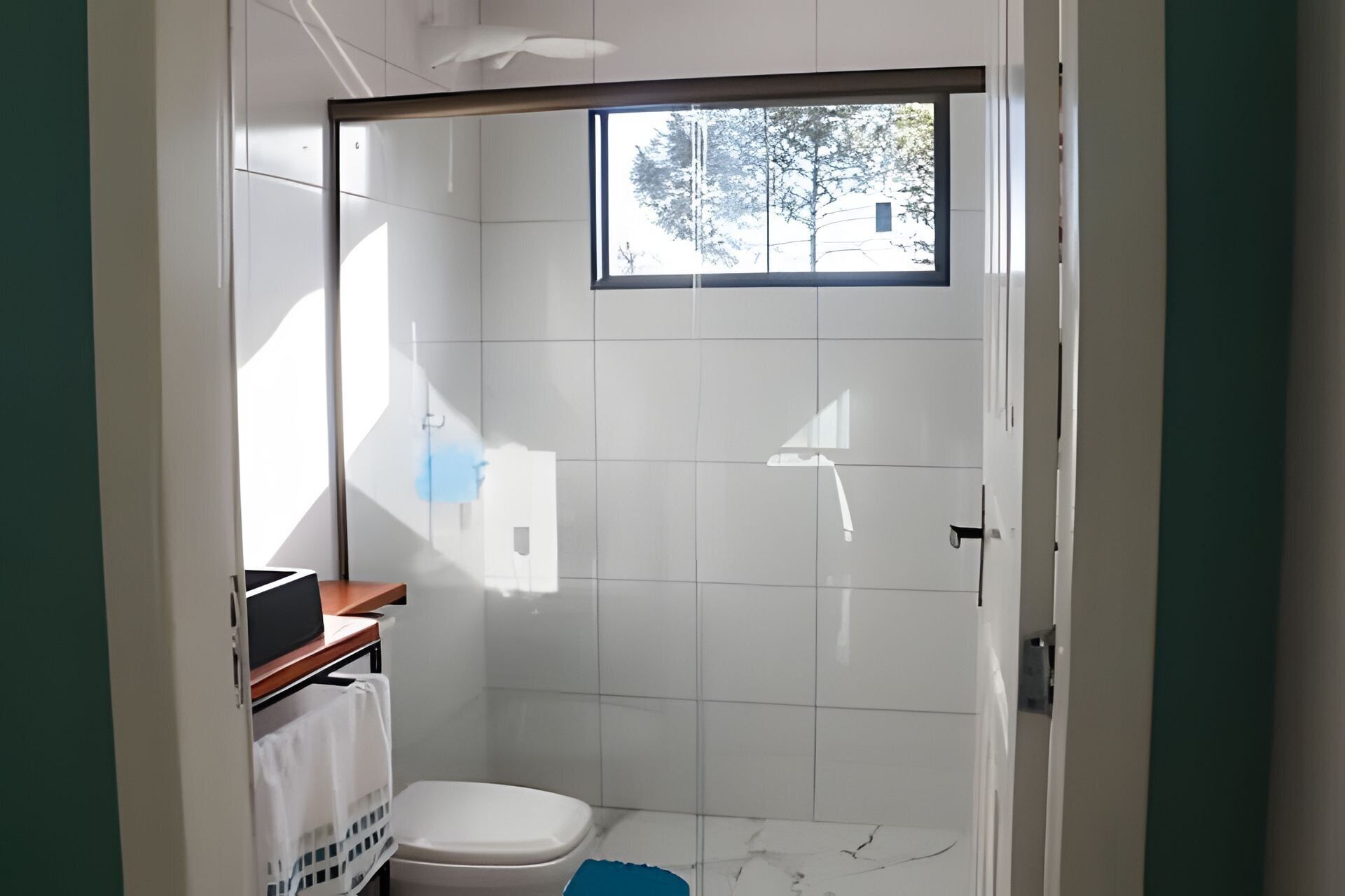 Casa, vista al jardín | Baño