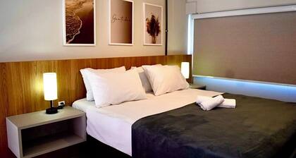 Charming 1-bedroom apartment steps to the Beach Jaguaruna with AC