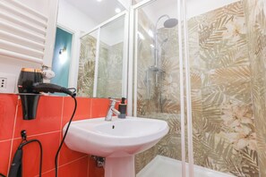 Hair dryer, bidet, towels, soap