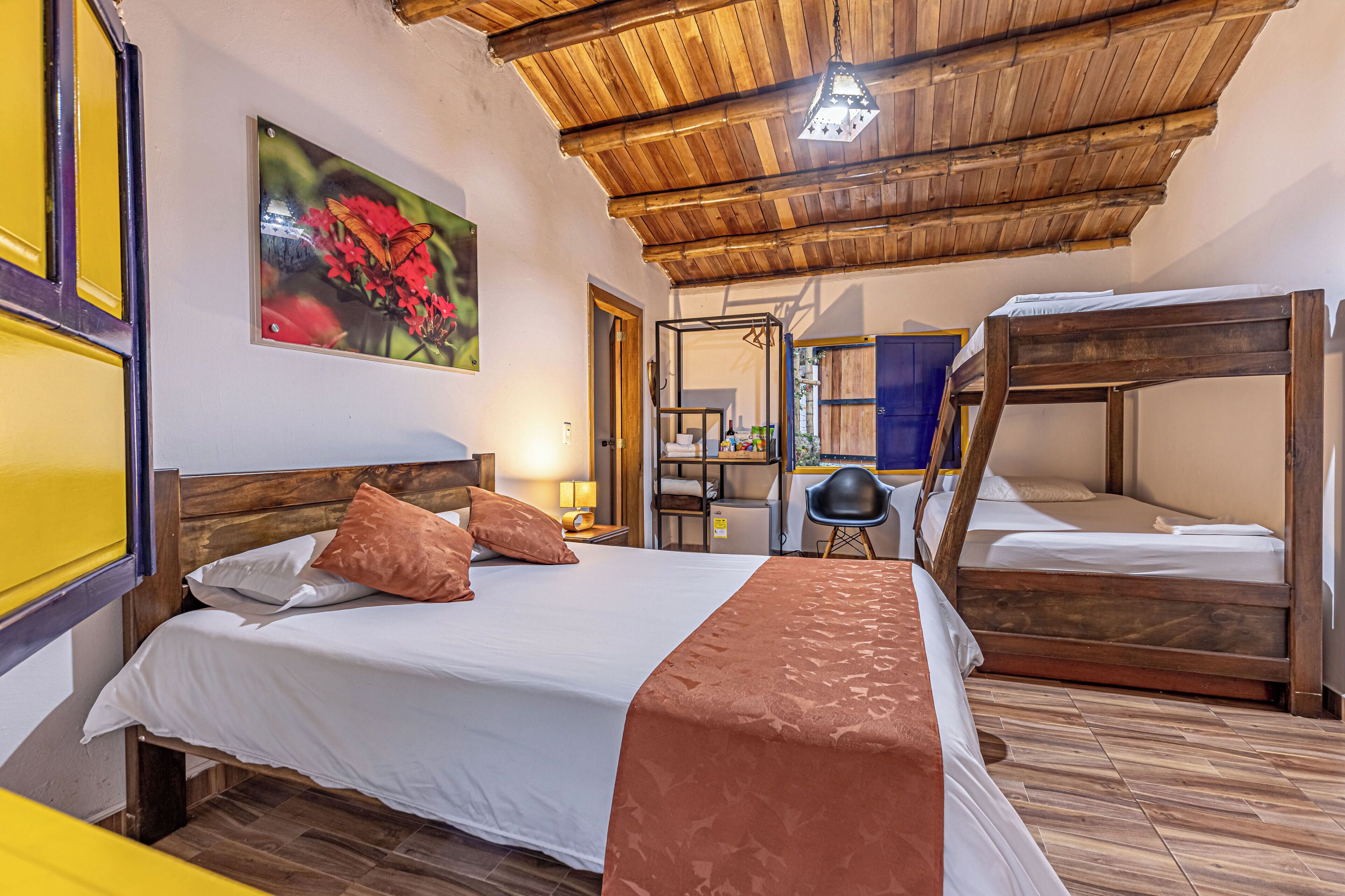 Family Room | Minibar, in-room safe, individually decorated, individually furnished