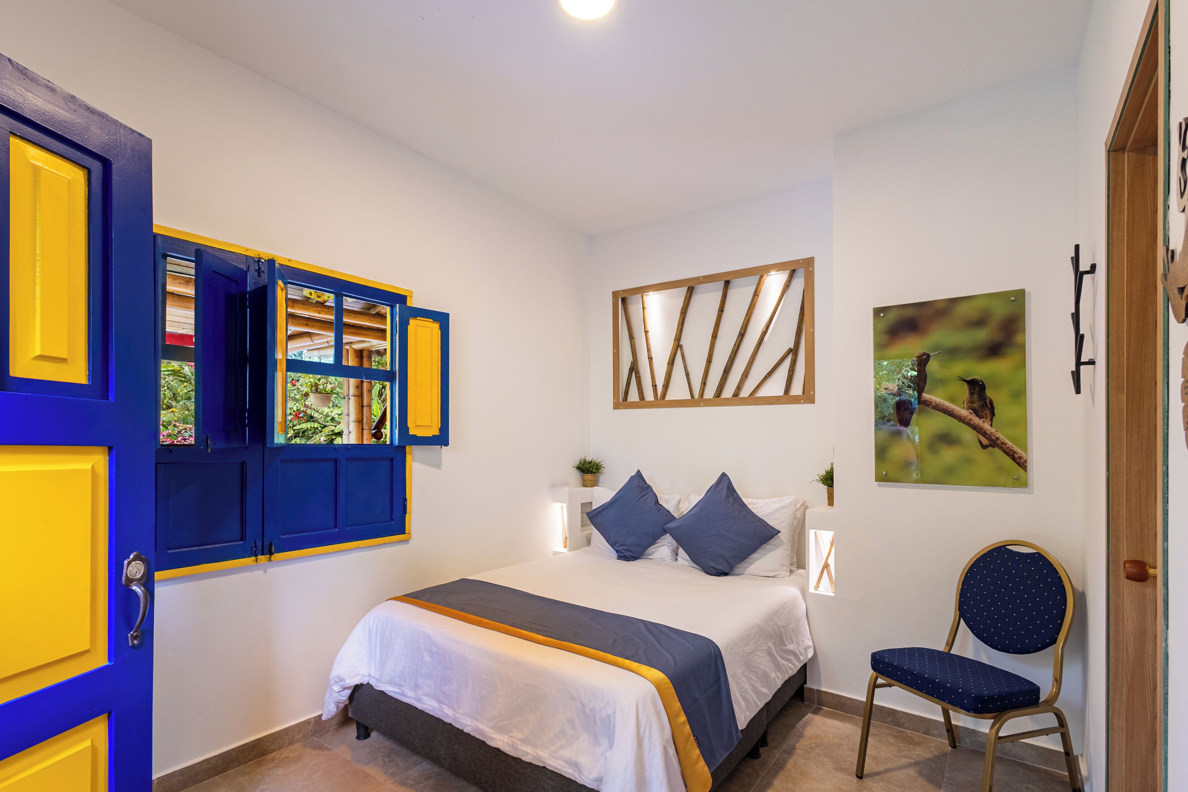 Comfort Double Room, Garden View | Minibar, in-room safe, individually decorated, individually furnished