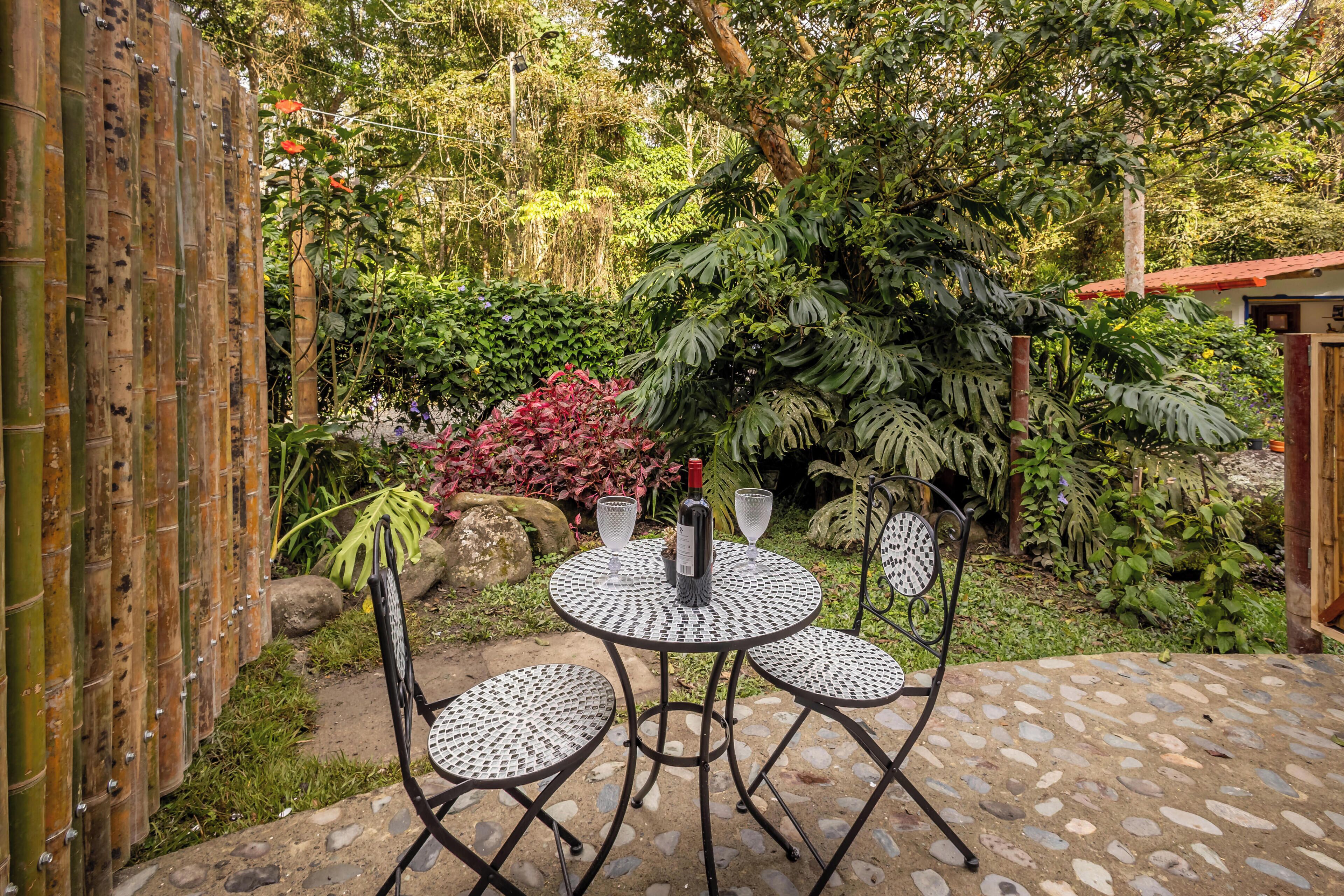 Chambre Confort, vue jardin | Coin séjour | Chauffage par le sol