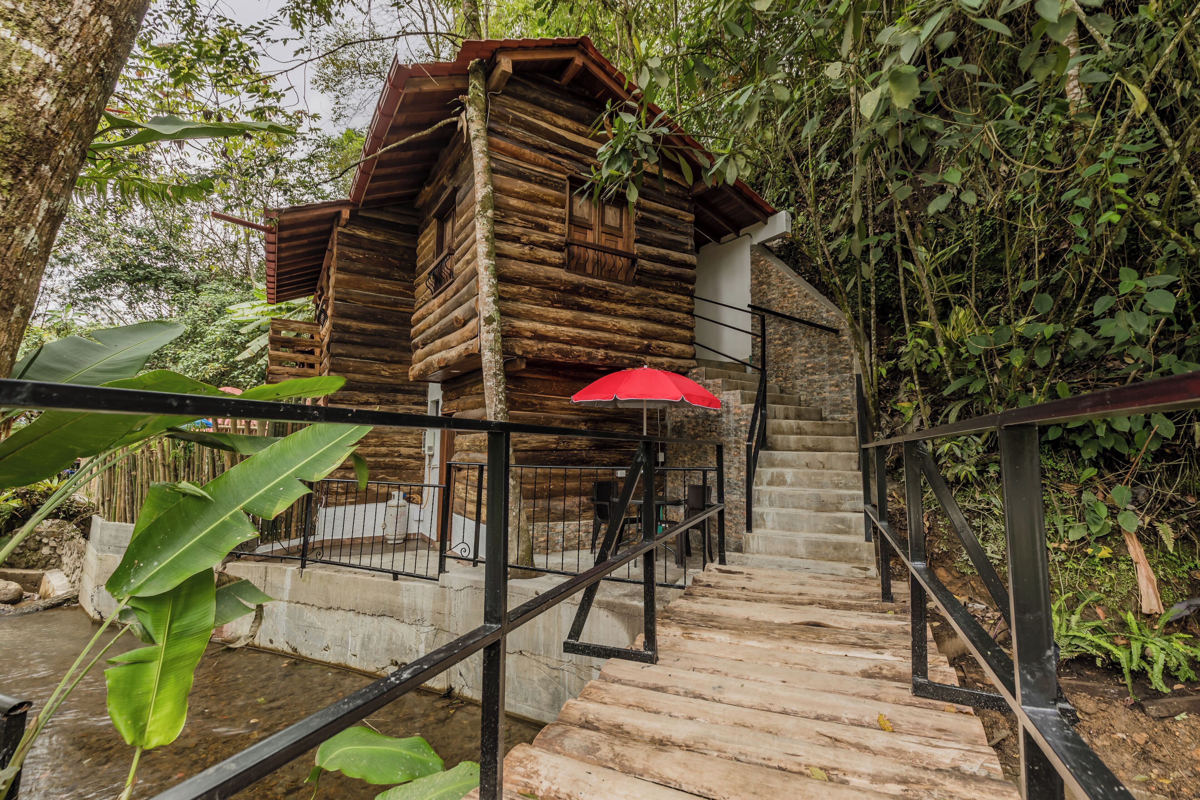 Junior Cabin, Patio, Mountain View | Minibar, in-room safe, individually decorated, individually furnished