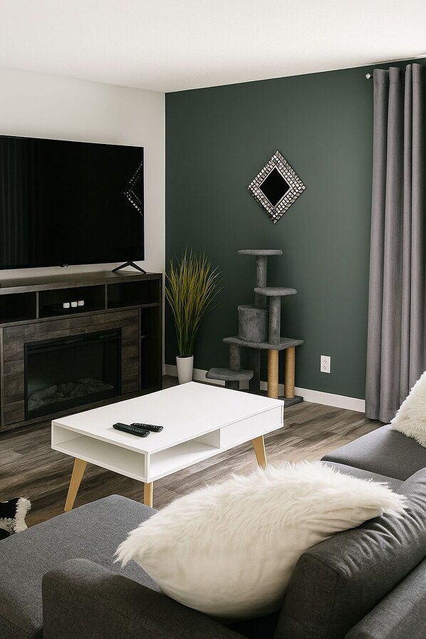 Living area - Newly renovated one bedroom apartment home away from home next to Bower mall. (Red Deer)