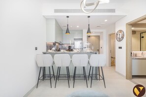 Luxury Apartment, Balcony, City View | In-room dining