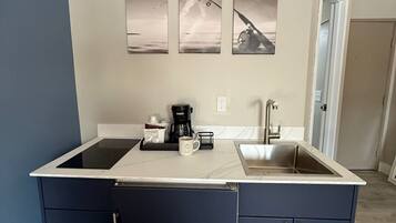 Fridge, microwave, coffee/tea maker, toaster