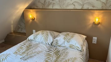 Fer et planche à repasser, draps fournis