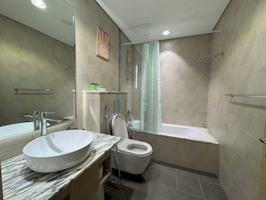 Hair dryer, towels, soap, shampoo