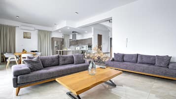 Luxury Villa, Sea View | Living area | 86-inch Smart TV with digital channels, fireplace, Netflix