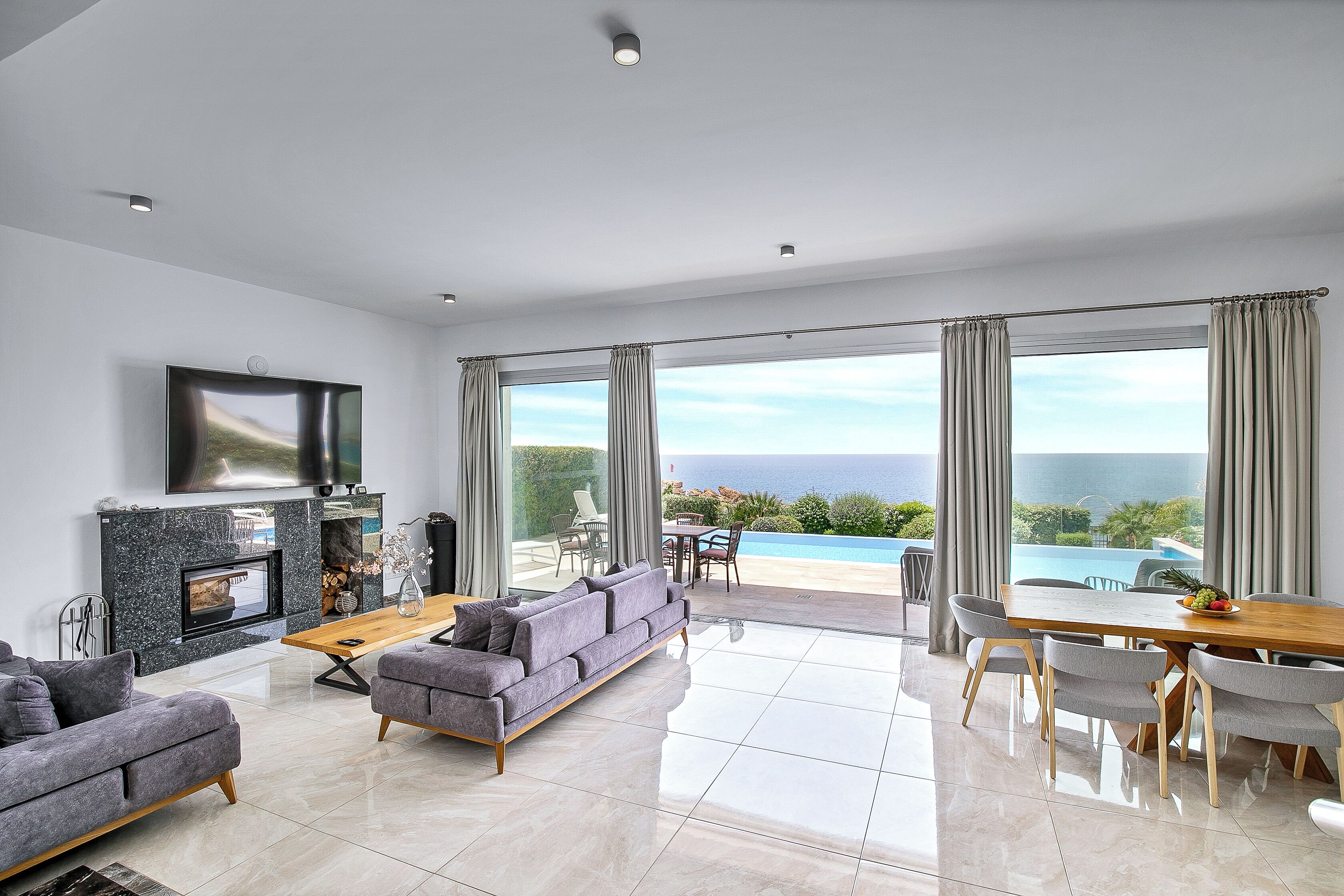 Luxury Villa, Sea View | Living area | 86-inch Smart TV with digital channels, fireplace, Netflix