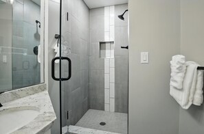 Shower, towels, soap, toilet paper