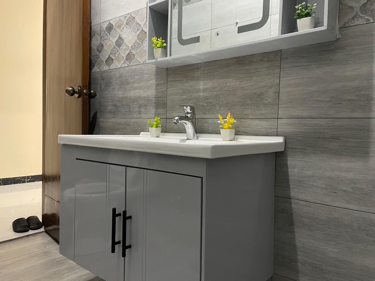 Shower, towels, soap, toilet paper