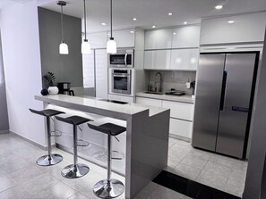 Private kitchen - Hermoso Apartamento en Mañongo - Valencia (Naguanagua)