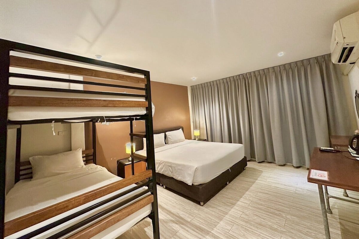 Family Suite | In-room safe, blackout drapes, iron/ironing board, free WiFi