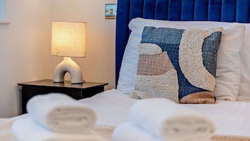 Iron/ironing board, travel crib, free WiFi, bed sheets