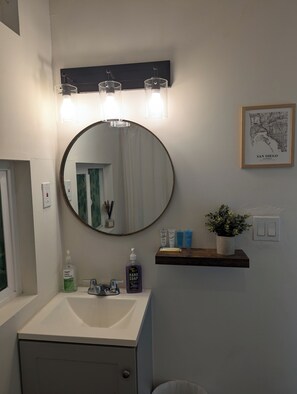 Hair dryer, towels, soap, shampoo