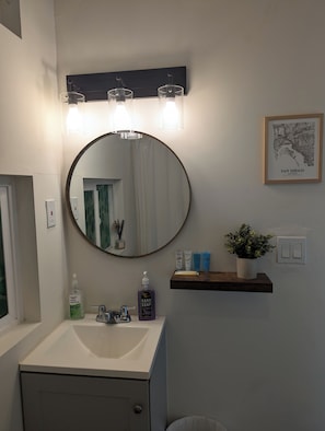 Hair dryer, towels, soap, shampoo