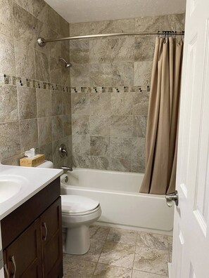 Hair dryer, towels, soap, shampoo