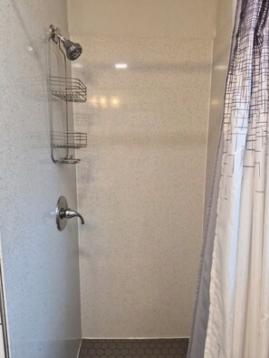 Shower, towels, soap, toilet paper