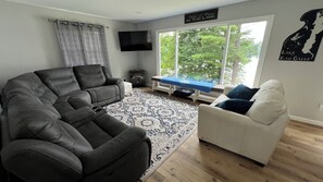 Smart TV, fireplace, books