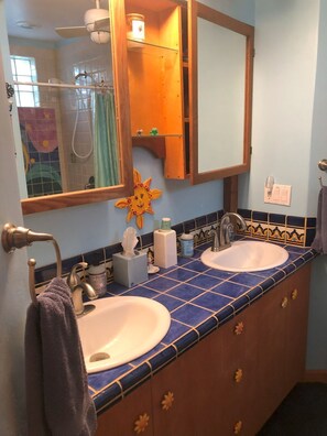 Hair dryer, towels, soap, shampoo