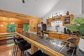 Microwave, oven, stovetop, dishwasher - Forest Escape • Themed Rooms • Hot Tub • Dollywood (Sevierville)