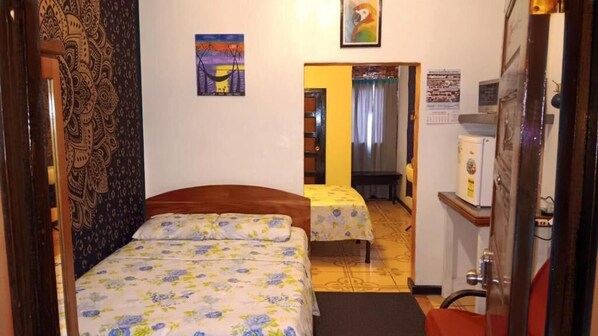 Family Studio Suite, Patio | In-room safe, soundproofing, iron/ironing board, free WiFi