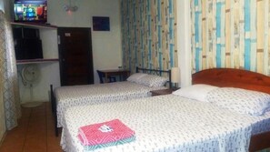 Classic Quadruple Room, Patio, City View | In-room safe, soundproofing, iron/ironing board, free WiFi