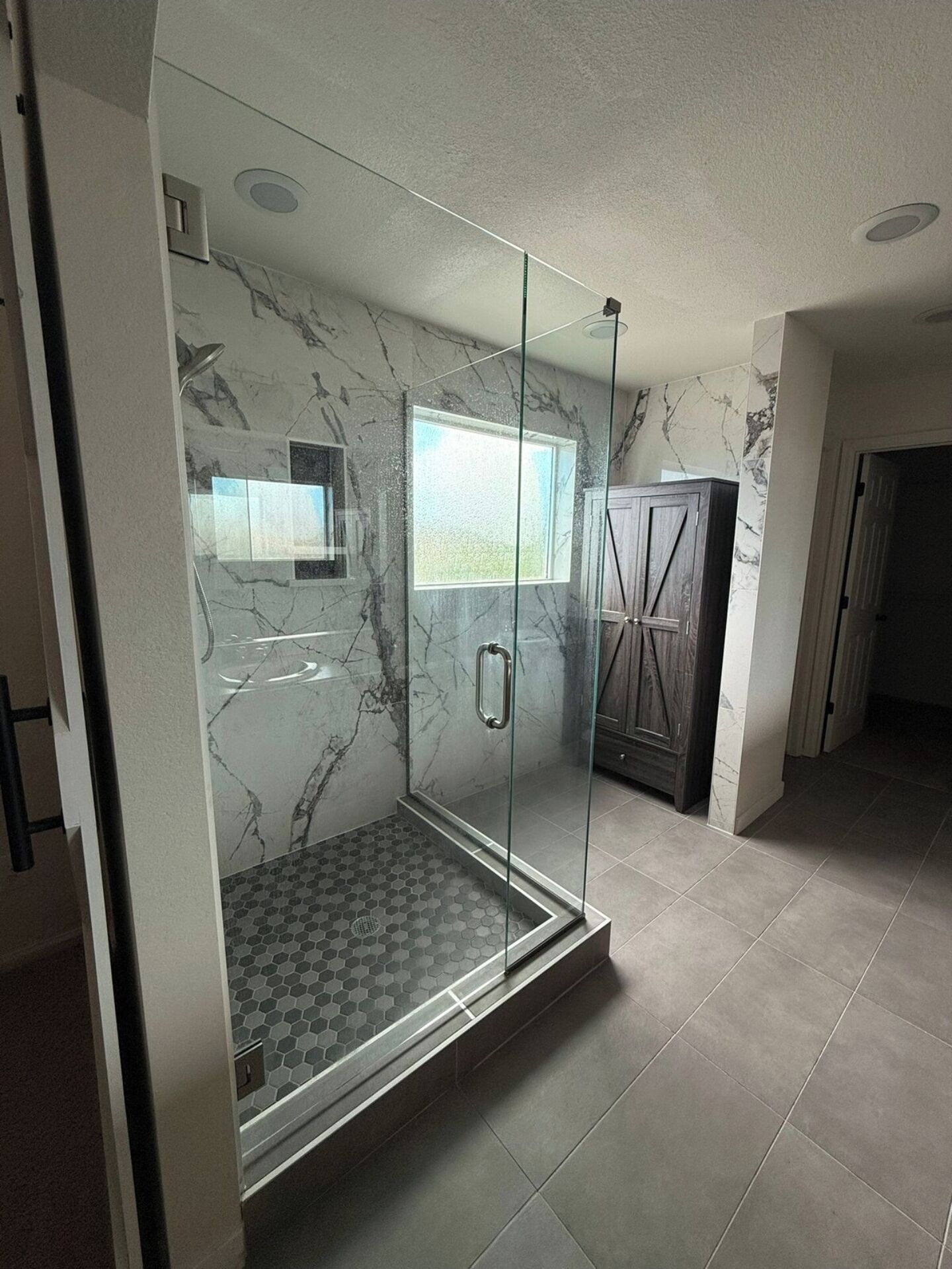 Shower, towels, soap, toilet paper