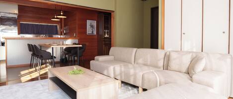 Appartement économique, non-fumeur | Aire de séjour | Téléviseur à écran plat