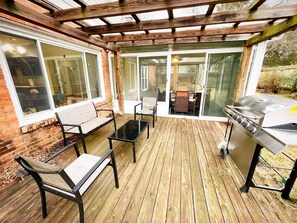 Outdoor dining - Spacious 4-Bedroom Retreat with Game Room and Backyard BBQ (Memphis)
