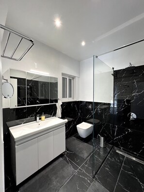 Shower, hair dryer, towels, soap