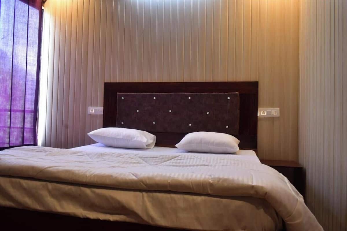 Chambre Deluxe | Surmatelas, Wi-Fi gratuit, draps fournis