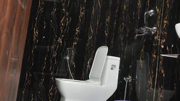 Ducha, artículos de tocador gratuitos, toallas, jabón