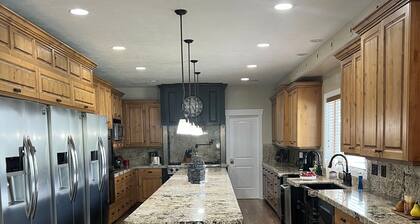 Spacious 10-bedroom Luxury Home with Fitness and Game room in charming Bluffdale