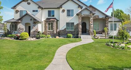 Spacious 10-bedroom Luxury Home with Fitness and Game room in charming Bluffdale