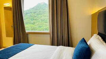 Deluxe Double Room, Mountain View | Desk, laptop workspace, free WiFi