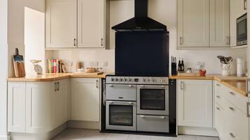 Fridge, microwave, oven, cookware/dishes/utensils