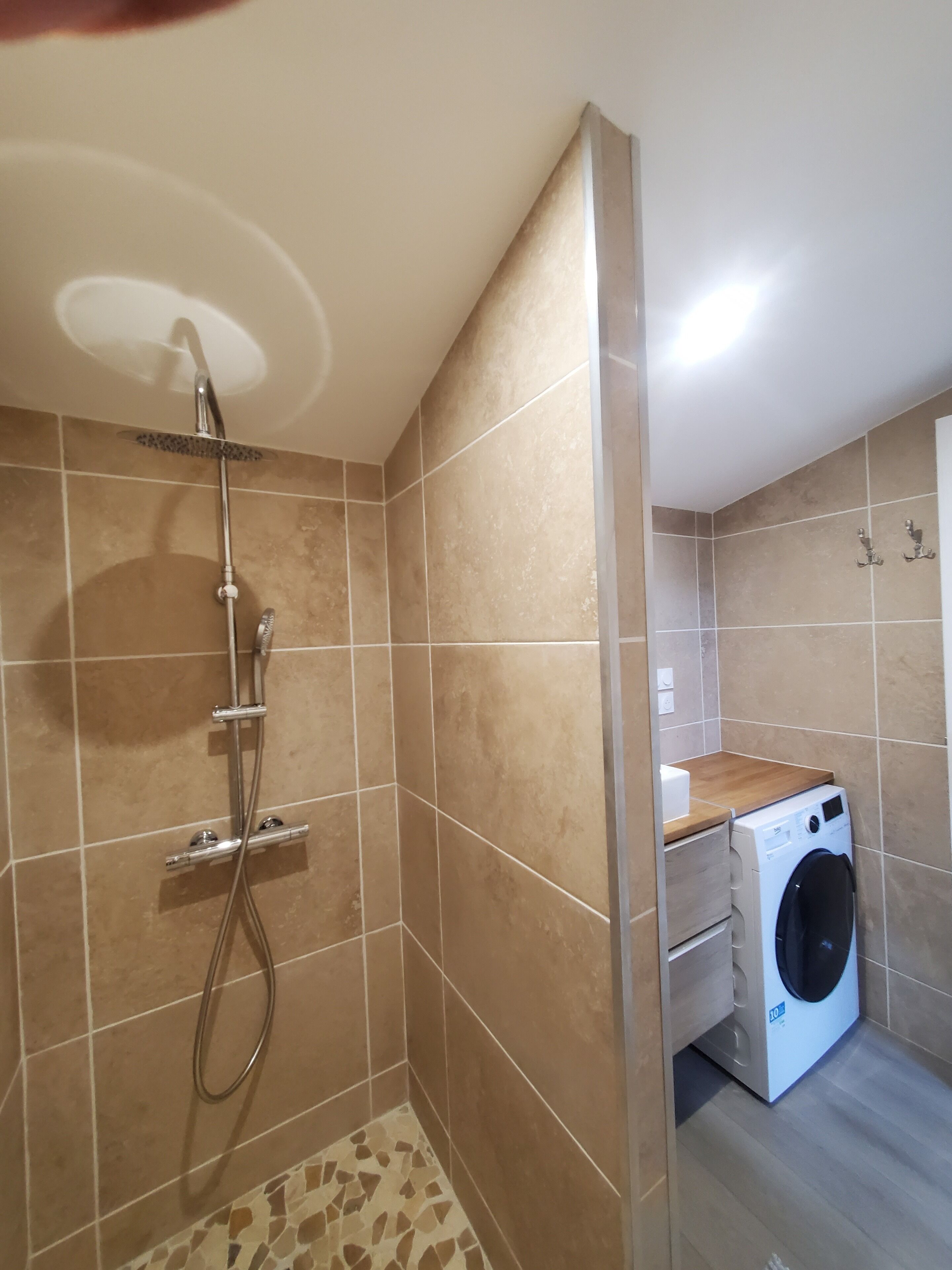 Shower, towels, soap, toilet paper