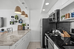 Signature Condo, 1 Bedroom, Balcony, Ocean View | Private kitchen | Fridge, microwave, stovetop, dishwasher - Oceanfront Stay with Private Balcony (Myrtle Beach)
