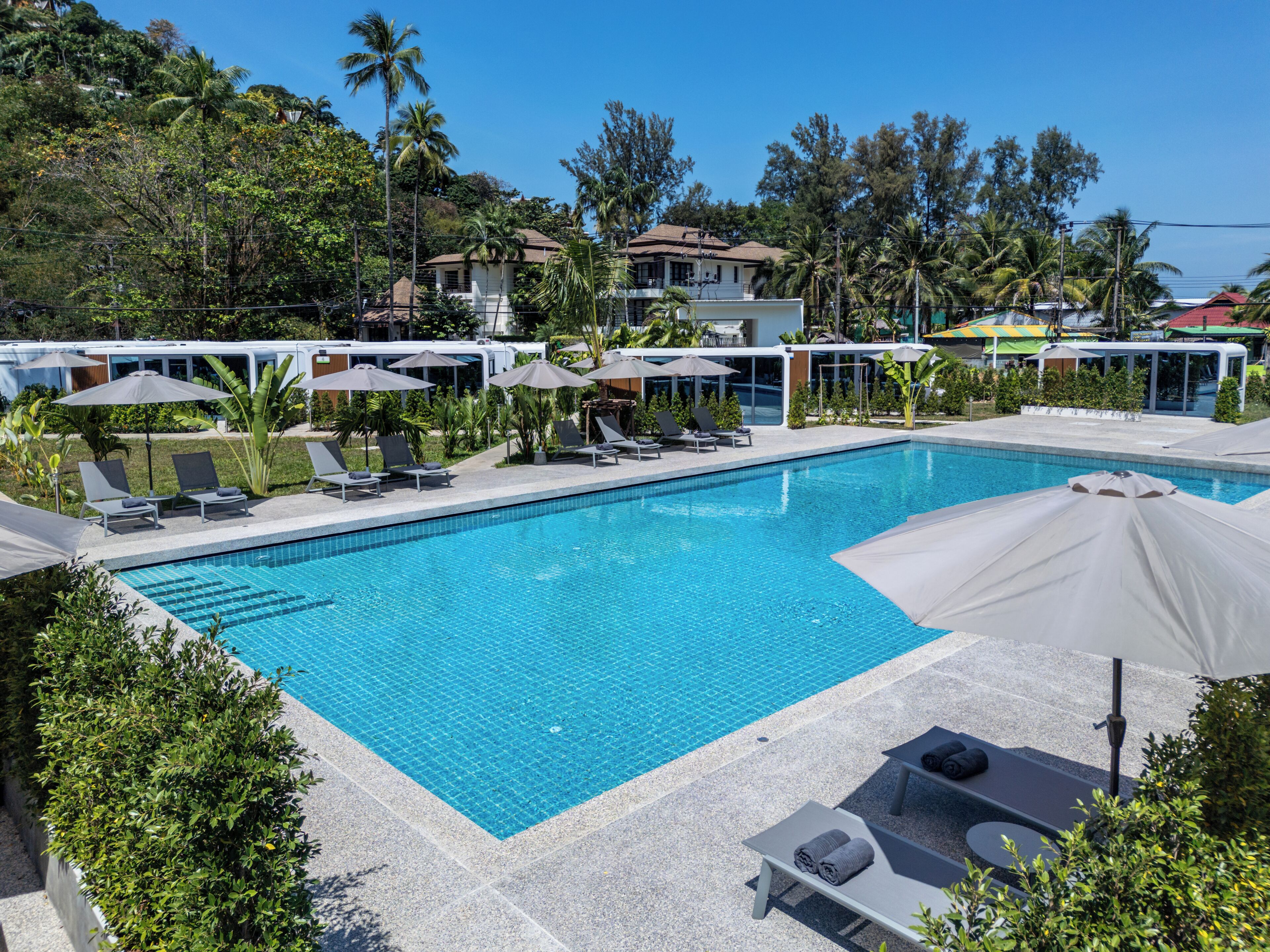 Outdoor pool, pool umbrellas, sun loungers
