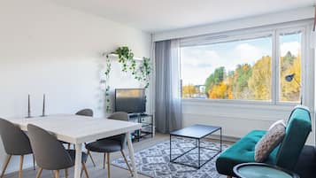 Deluxe-Apartment, Balkon | Wohnbereich