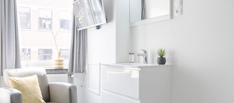 Perfect for solo travelers looking for a simple and budget-friendly base. This cozy room comes with a TV and workspace, and you’ll have access to a shared kitchen and shared bathroom.