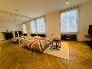 2 bedrooms, desk, iron/ironing board, travel crib