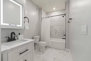 Shower, hair dryer, shampoo