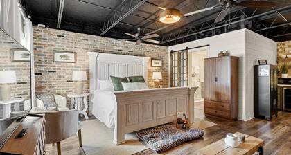 Water Street Retreat is a cozy dog-friendly studio in downtown Biloxi, steps from beaches, casinos, and dining. King bed, sofa bed, kitchenette, modern bath, Wi-Fi, easy parking, plus an art cart, board games, and record player with vinyl.
