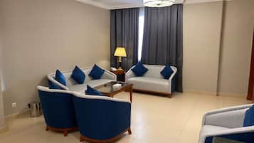 Family Apartment, City View | In-room safe, desk, laptop workspace, blackout drapes