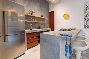 Fridge, coffee/tea maker, cookware/dishes/utensils
